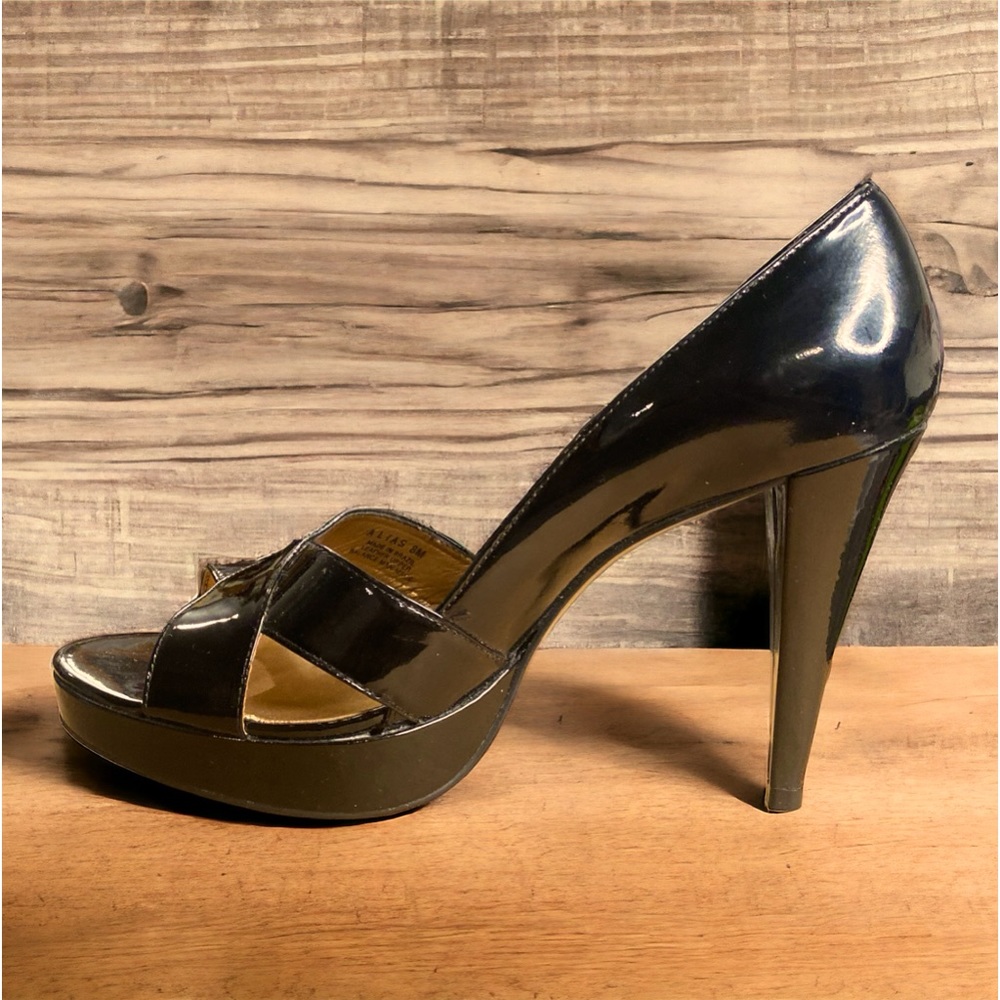 Alias black patent pumps from Carlos Santana.